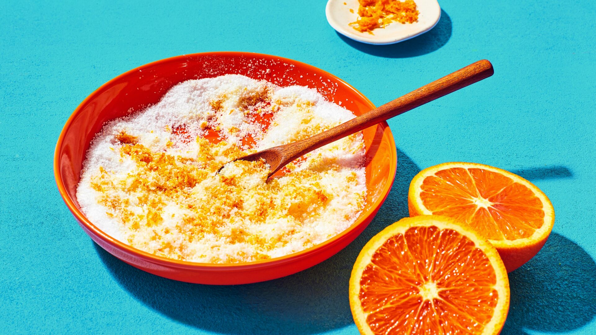 Large bowl of Cara Cara citrus bath salt with Peelz citrus zest.