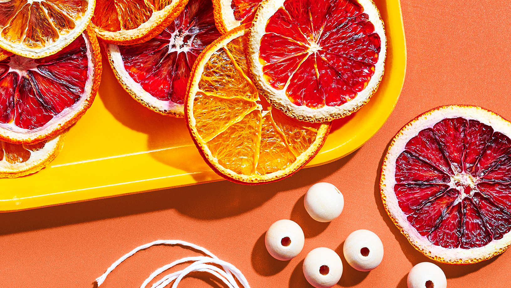 A tray of dried Peelz citrus for a DIY citrus garland