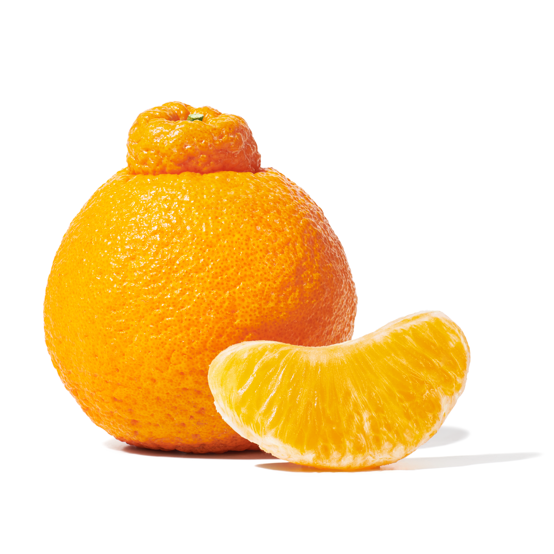 Whole Peelz Dekos Orange with a peeled piece of orange.