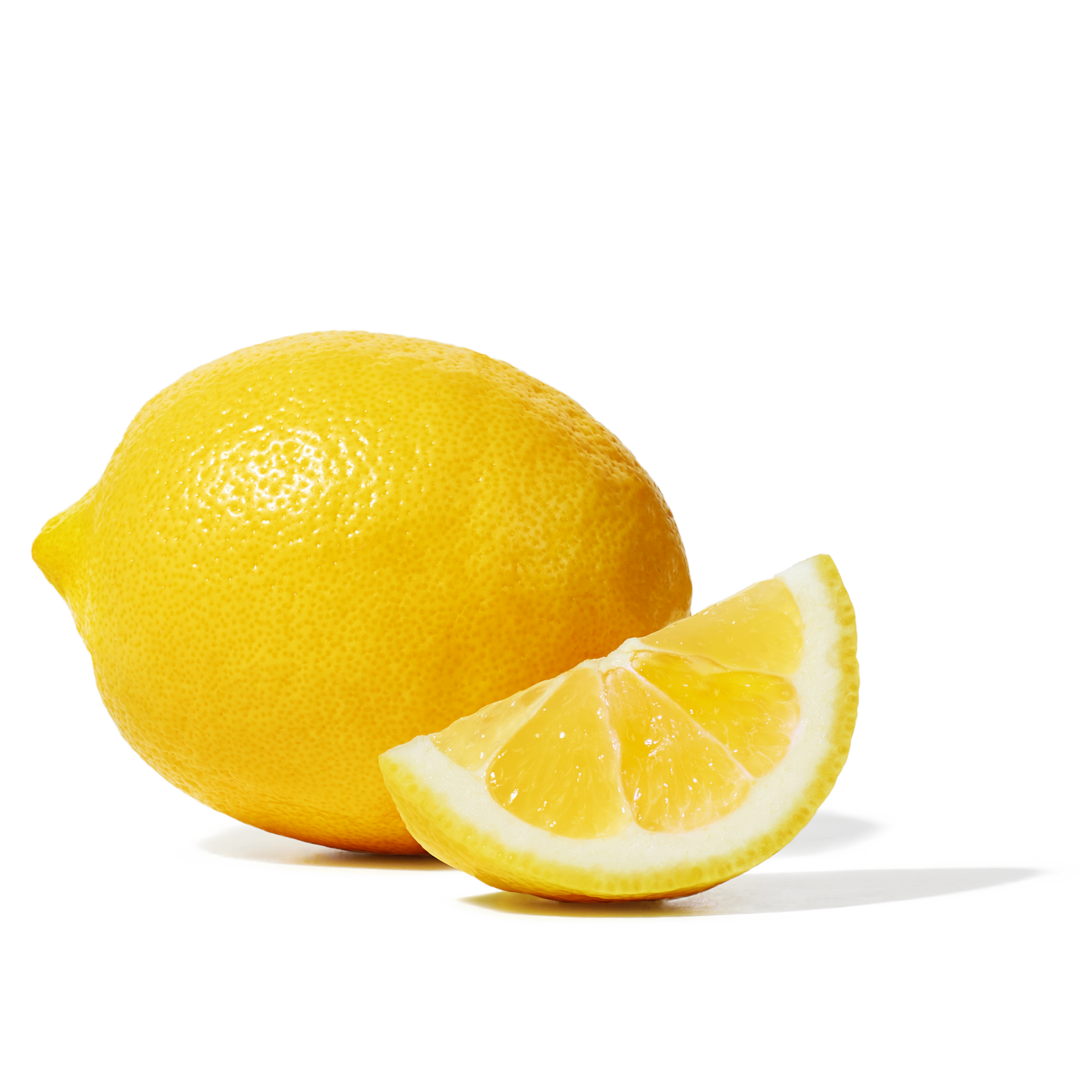 A whole Peelz lemon with a lemon wedge